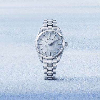 Montre Grand Seiko Heritage "Skyflake" quartz cadran bleu bracelet acier 33 mm