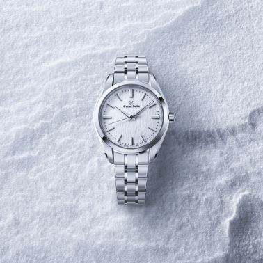 Montre Grand Seiko Heritage "Snowflake" quartz cadran blanc bracelet acier 33 mm