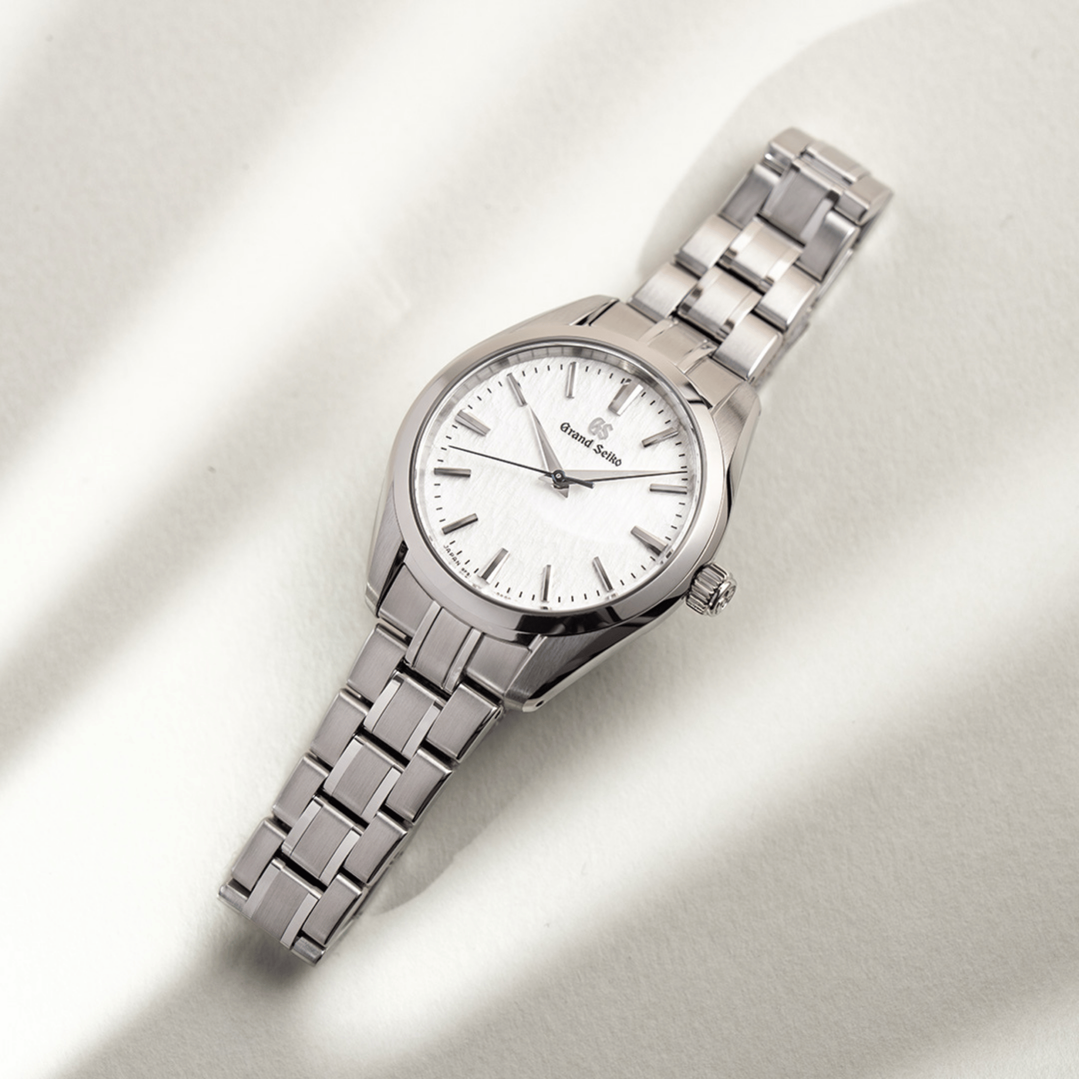 Grand Seiko Heritage "Snowflake" quartz white dial steel bracelet 33 mm