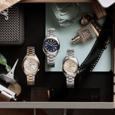 Montre Seiko 5 Sports SNXS automatique cadran champagne bracelet acier 32 mm