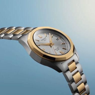 Montre Tissot T-Classic PRC 100 Solar quartz solaire bicolore PVD Or Jaune cadran argenté bracelet acier 34 mm