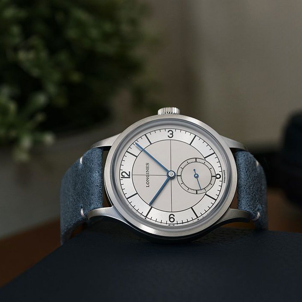 Montre Longines Heritage Classic automatique cadran beige bracelet cuir bleu 38,5 mm L2.828.4.73.2