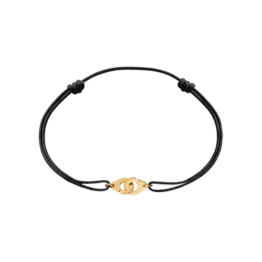 Bracelet Dinh Van Menottes R8 en or jaune sur cordon