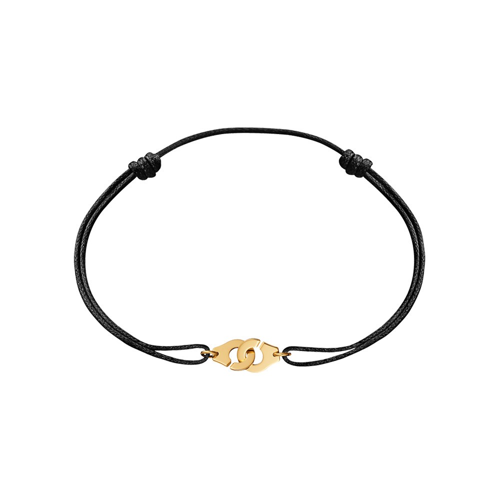 Bracelet Dinh Van Menottes R8 en or jaune sur cordon