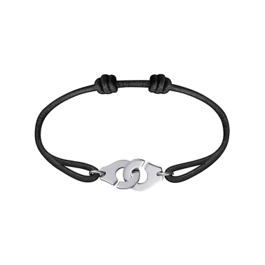Bracelet Dinh Van Menottes R12 en platine sur cordon