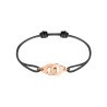 Bracelet Dinh Van Menottes R12 en or rose sur cordon
