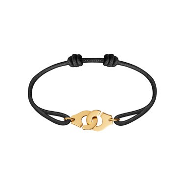 Bracelet Dinh Van Menottes R12 en or jaune sur cordon