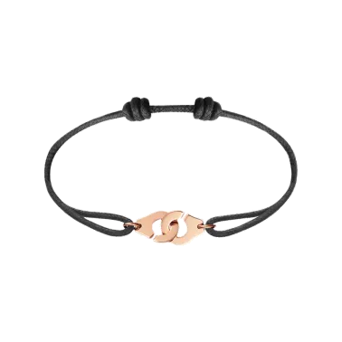 Bracelet Dinh Van Menottes R10 en or rose sur cordon - SOLDAT
