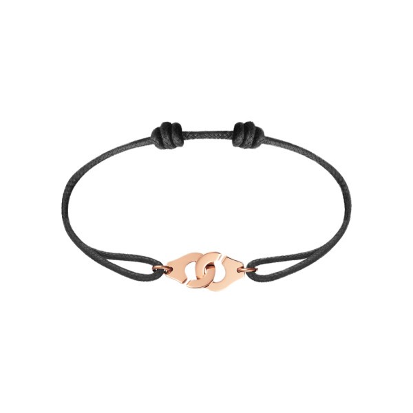 Bracelet Dinh Van Menottes R10 en or rose sur cordon