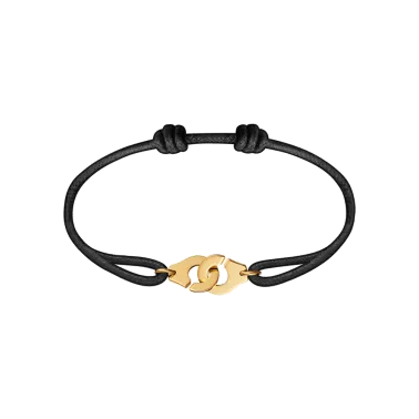 Bracelet Dinh Van Menottes R10 en or jaune sur cordon - SOLDAT PL