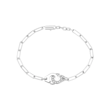 Bracelet Dinh Van Menottes R10 en or blanc et pavage diamants sur chaîne