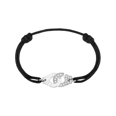 Bracelet Dinh Van Menottes R12 en or blanc et diamants sur cordon - SOLDAT