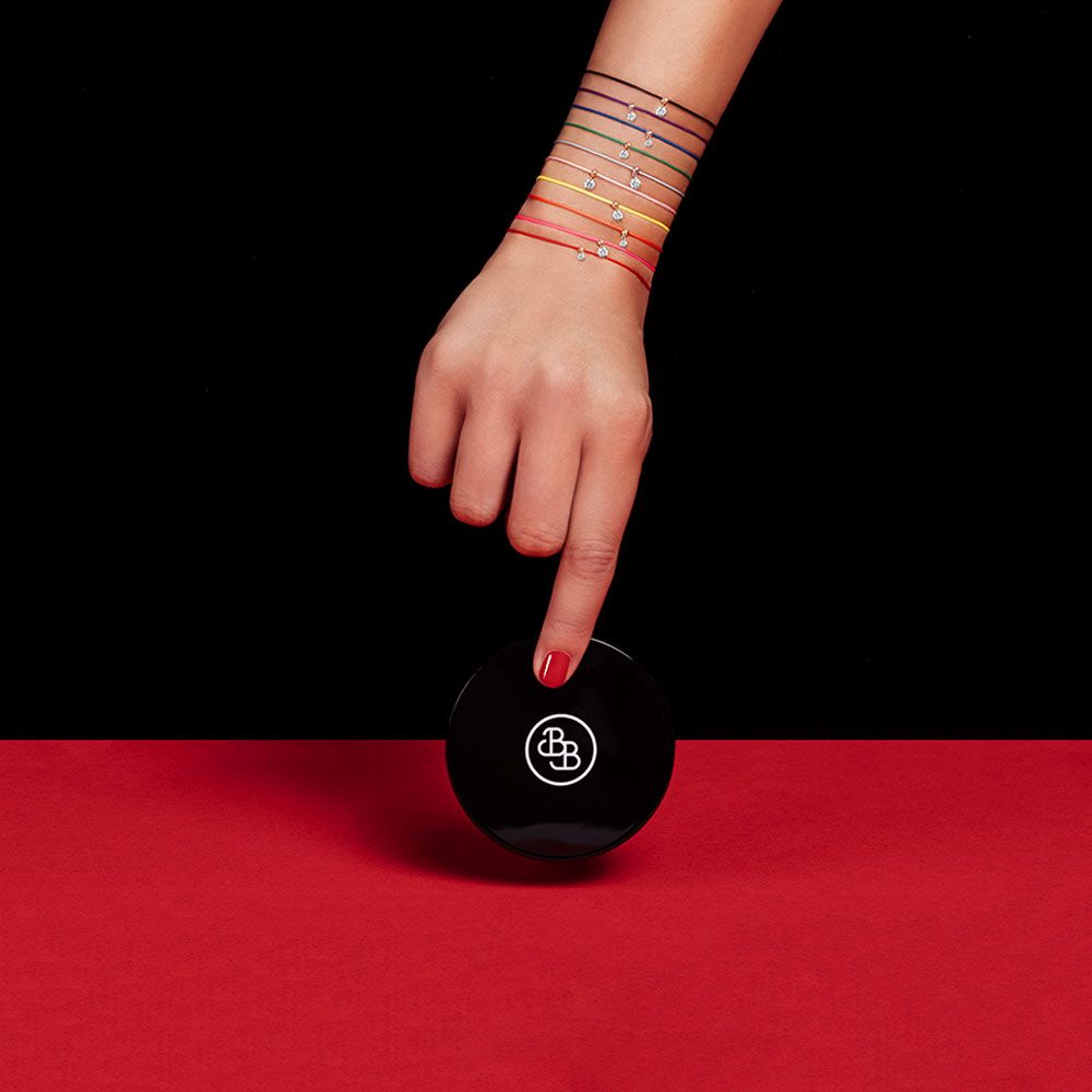 Bracelet cordon La Brune et La Blonde nude en or jaune et diamant 0,15 carat