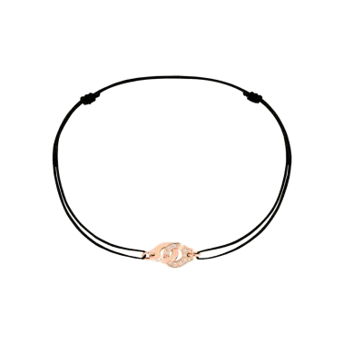 Bracelet Dinh Van Menottes R8 en or rose et diamants sur cordon