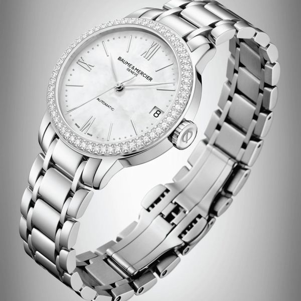 Montre Baume et Mercier Classima automatique lunette sertie cadran nacre bracelet acier 31 mm