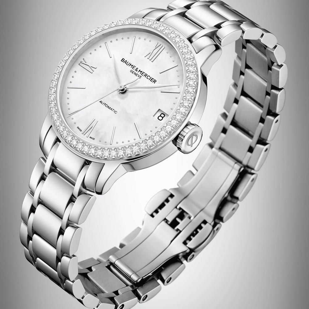 Montre Baume et Mercier Classima automatique lunette sertie cadran nacre bracelet acier 31 mm
