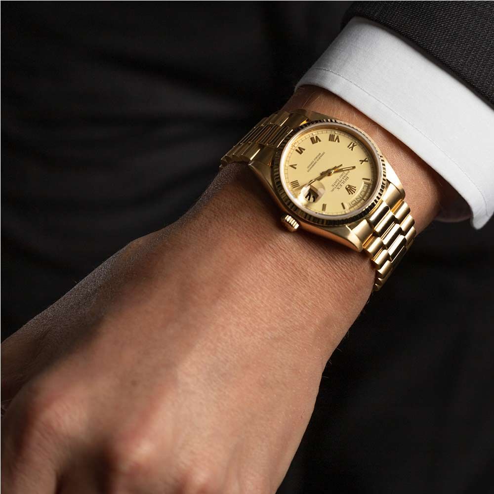 Montre Rolex Day Date or jaune 750 milli mes 1980 Ref.18038