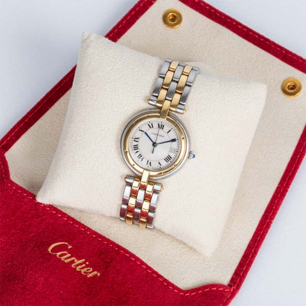 Montre Cartier Panthere ronde quartz or et acier 1990s 30mm