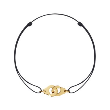 Bracelet Dinh Van Menottes R15 en or jaune sur cordon