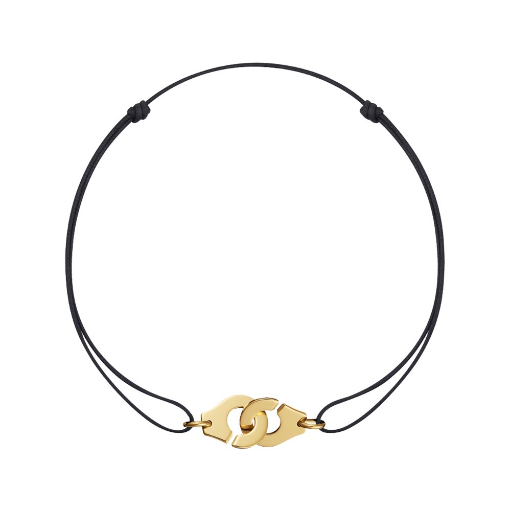 Bracelet Dinh Van Menottes R15 en or jaune sur cordon