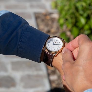 Montre Longines Master Collection automatique or rose cadran argenté bracelet cuir brun 40 mm