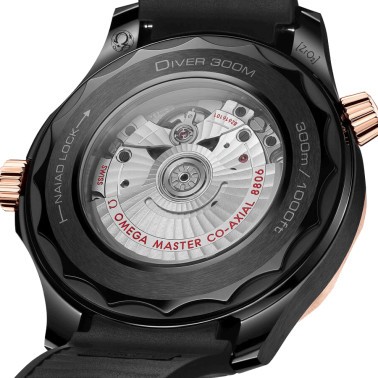 Omega Seamaster Diver 300 Co-Axial Master Chronometer Ceramic and Gold Sedna watch black dial black rubber strap 43,5 mm 210.62.