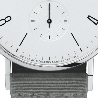 Montre Nomos Tangente 38 - 50 ans de Médecins Sans Frontières Ed. limitée 2021 ex. automatique cadran blanc bracelet textile gri