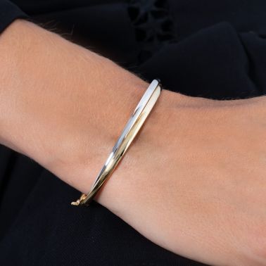 Bangle Les Poinçonneurs Gaia in yellow gold and white gold