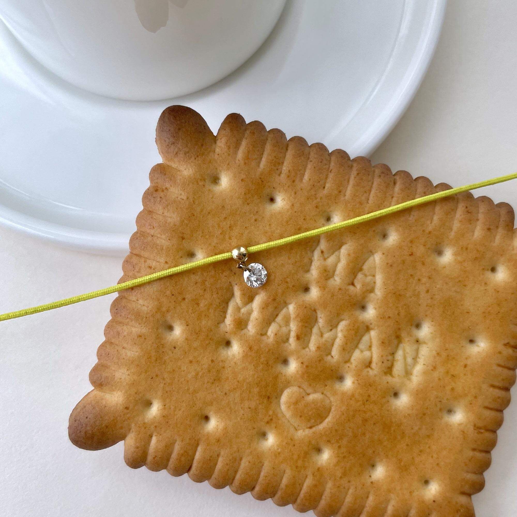 Bracelet cordon La Brune et La Blonde jaune en or rose et diamant 0,15 carat