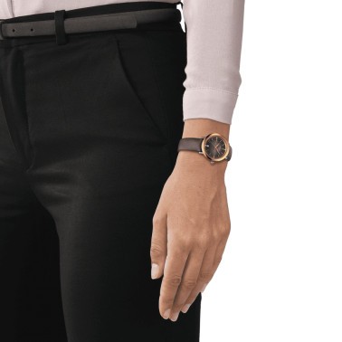 Montre Tissot Glendora quartz lunette or jaune cadran gris bracelet cuir gris 33 mm T929.210.46.066.00