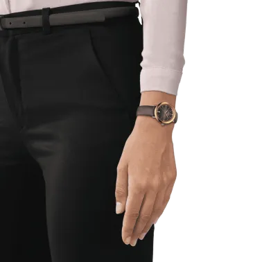 Montre Tissot Glendora quartz lunette or jaune cadran gris bracelet cuir gris 33 mm T929.210.46.066.00