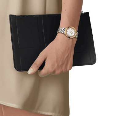 Montre Tissot Glendora quartz lunette or jaune cadran couleur nacre blanche bracelet acier 33 mm T929.210.41.116.01