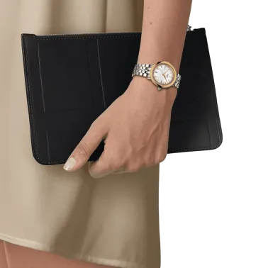 Montre Tissot Glendora quartz lunette or jaune cadran couleur nacre blanche bracelet acier 33 mm T929.210.41.116.01