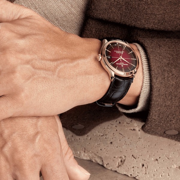 Montre Baume et Mercier Clifton Baumatic Or rose automatique cadran bordeaux bracelet cuir noir 39 mm