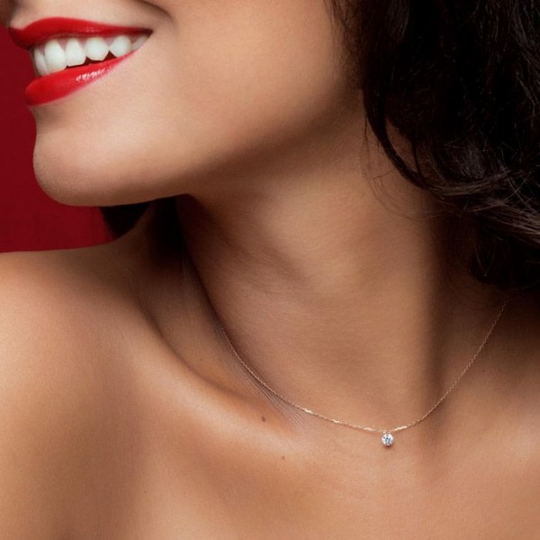 Pendentif La Brune et La Blonde 360° en or blanc et diamant 0,20 carat - Porte