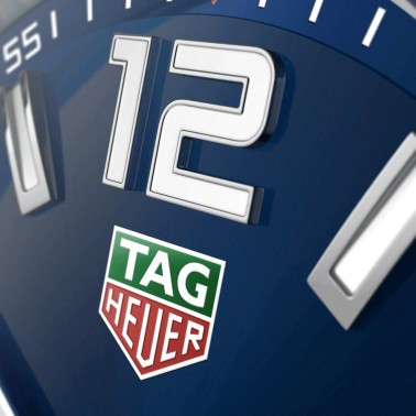 Montre TAG Heuer Formula 1 quartz cadran bleu soleillé lunette bleue bracelet acier 43 mm