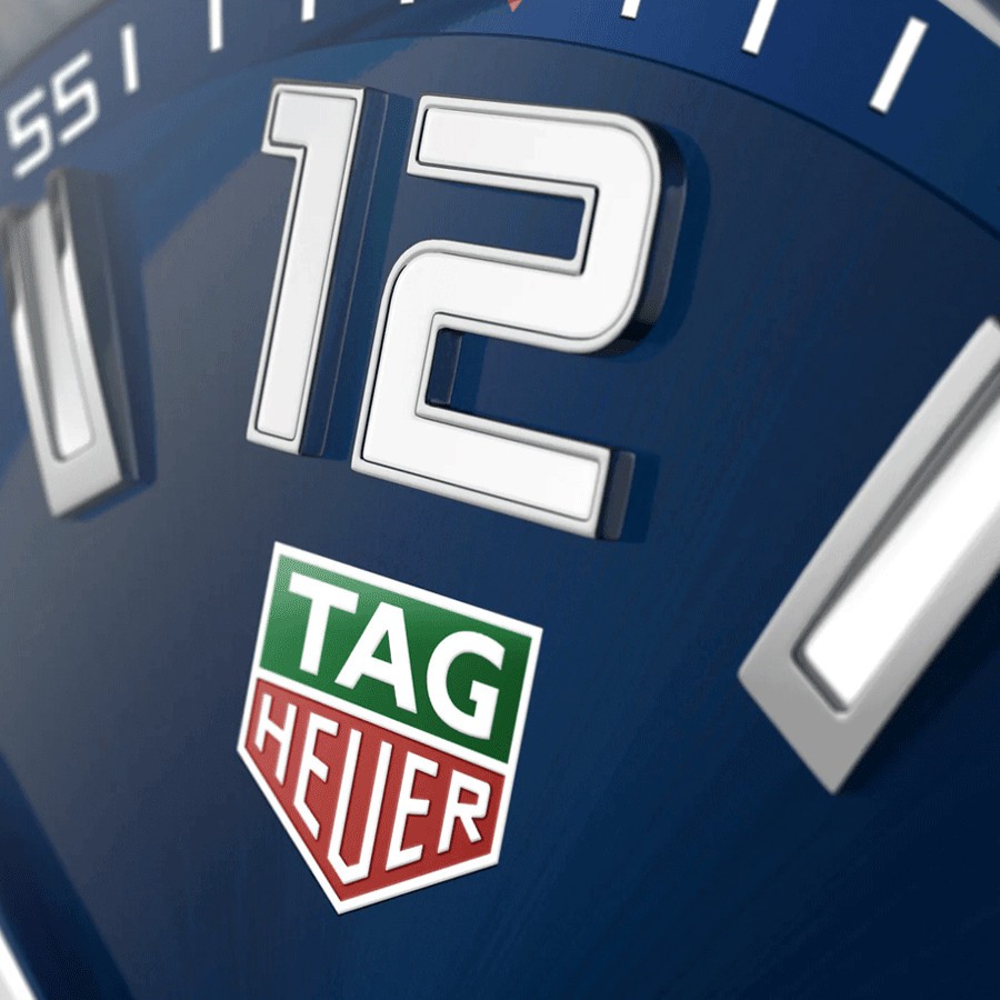 Montre TAG Heuer Formula 1 quartz cadran bleu soleillé lunette bleue bracelet acier 43 mm