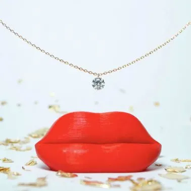 Pendentif La Brune et La Blonde 360° en or jaune et diamant 0,10 carat