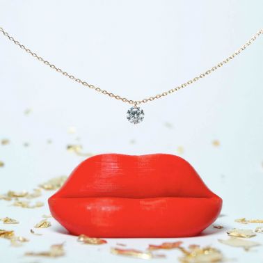 Pendentif La Brune et La Blonde 360° en or jaune et diamant 0,20 carat