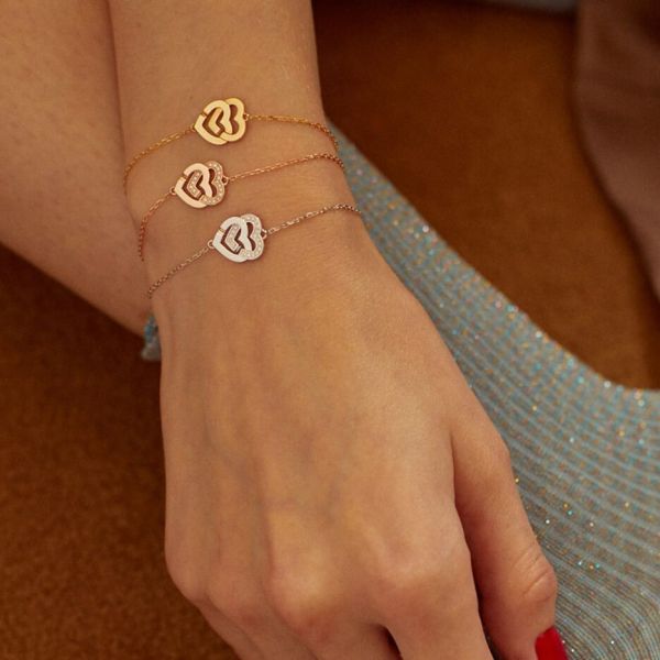 Double Hearts R10 dinh van bracelet in pink gold and diamonds Lepage