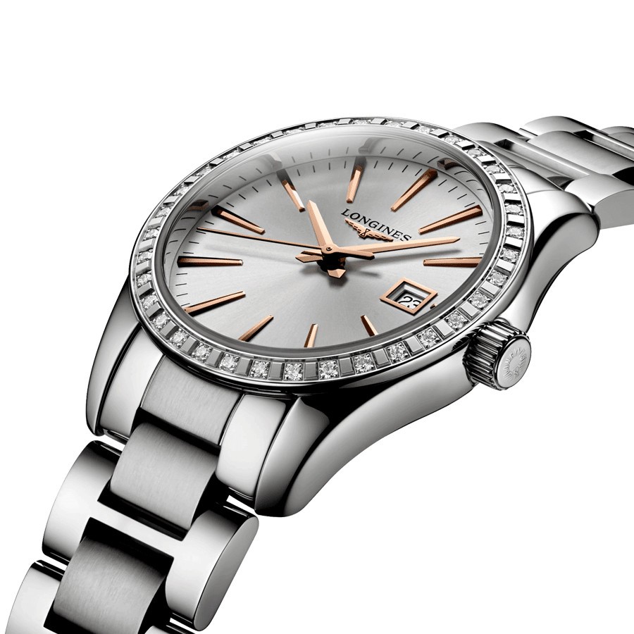 Montre Longines Conquest Classic quartz cadran argenté lunette sertie bracelet acier 29,5 mm L2.286.0.72.6