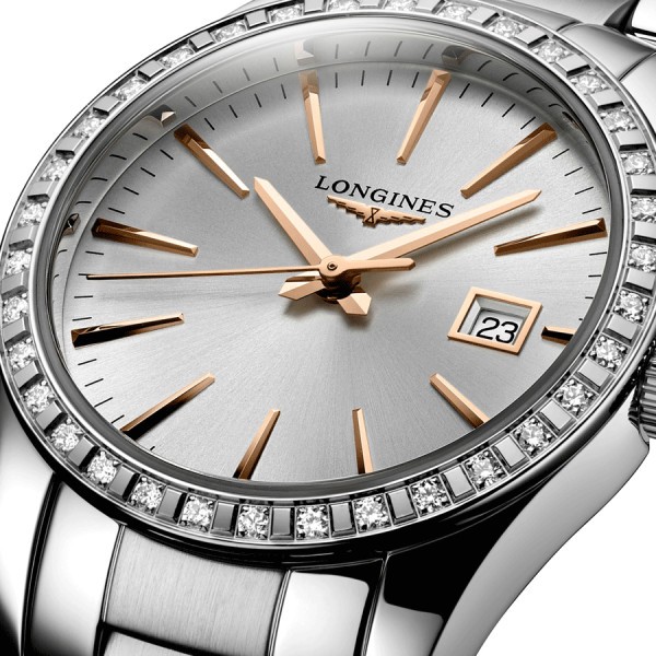 Montre Longines Conquest Classic quartz cadran argenté lunette sertie bracelet acier 29,5 mm L2.286.0.72.6