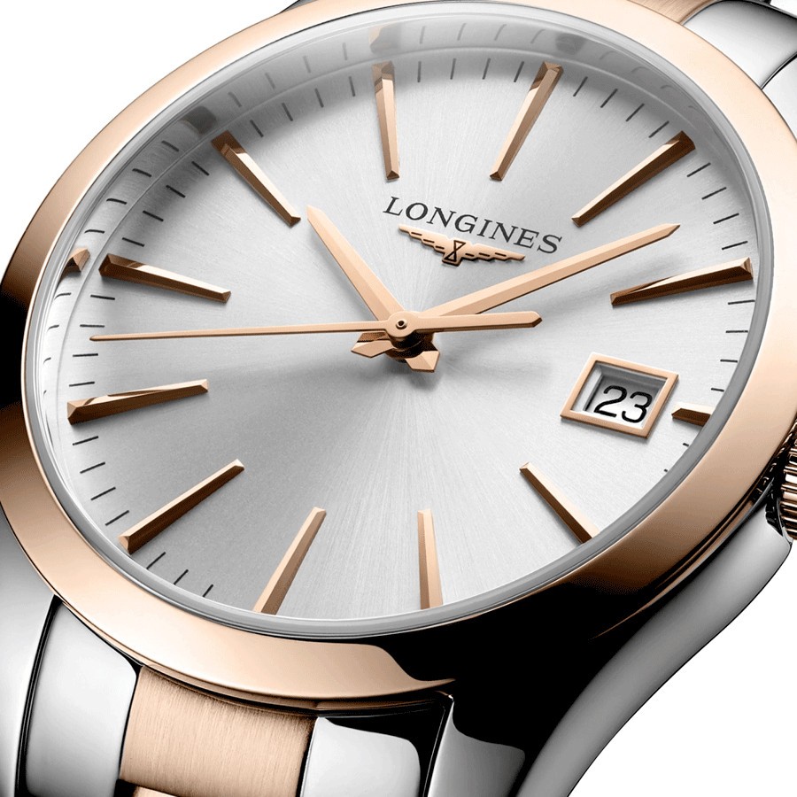 Montre Longines Conquest Classic quartz cadran argenté bracelet bicolore 34 mm L2.386.3.72.7