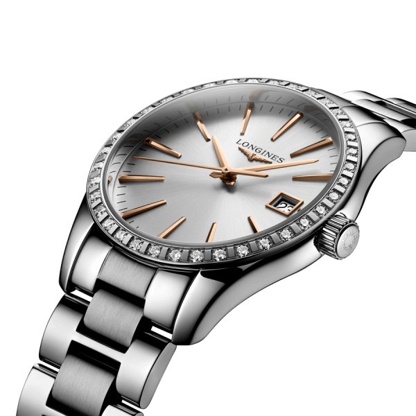 Montre Longines Conquest Classic quartz cadran argenté lunette sertie bracelet acier 34 mm L2.386.0.72.6