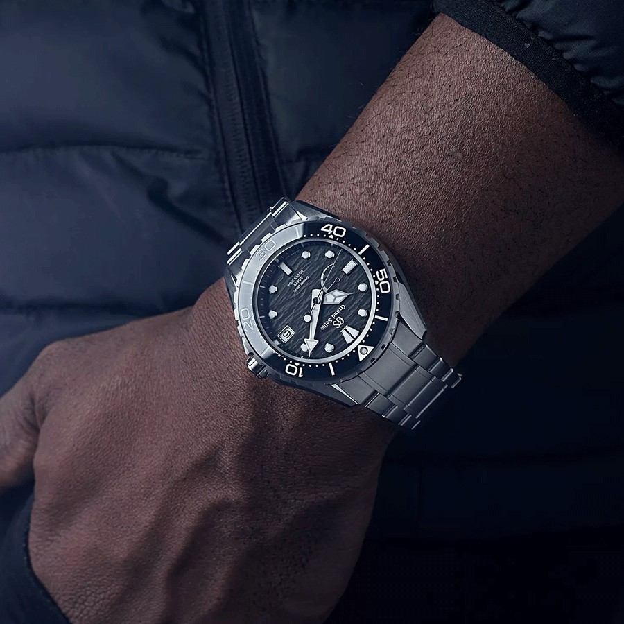 Montre Grand Seiko Evolution 9 Plongée Titane Spring Drive cadran noir bracelet titane 43,8 mm