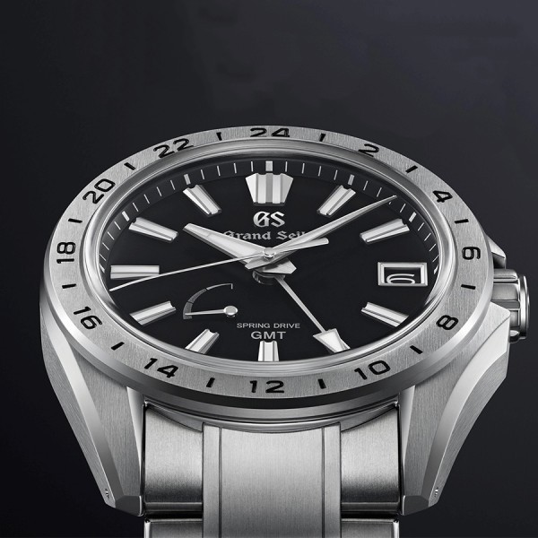 Montre Grand Seiko Evolution 9 GMT Titane Spring Drive cadran noir bracelet titane 41 mm