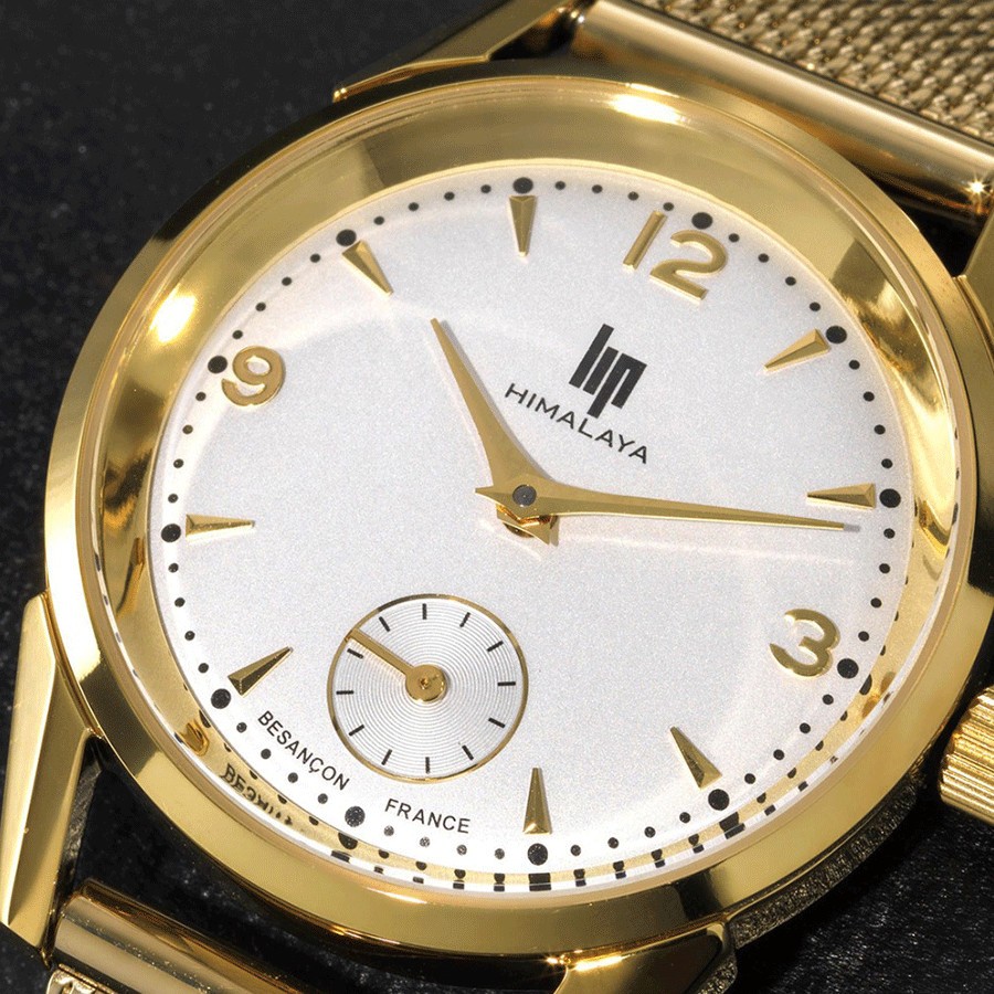 Montre Lip Himalaya quartz PVD or jaune cadran blanc argenté bracelet acier en mailles milanaises doré 29 mm