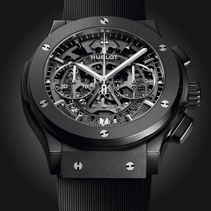 Montre Hublot Classic Fusion Aerofusion Black Magic automatique cadran squelette bracelet caoutchouc noir 45 mm 525.CM.0170.RX