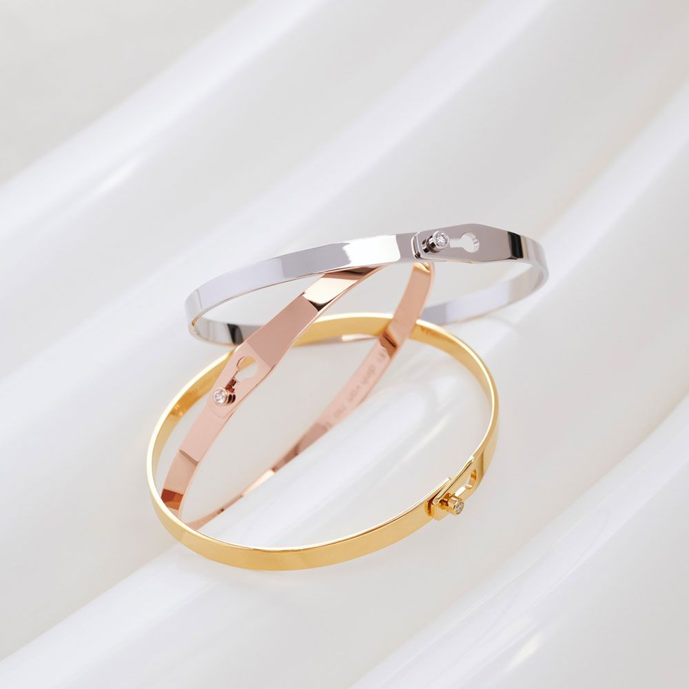 Bracelet Dinh Van Serrure en or rose et diamant