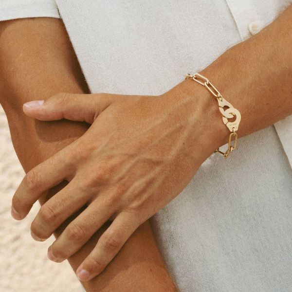 Bracelet sur chaîne Menottes dinh van R15 en or jaune